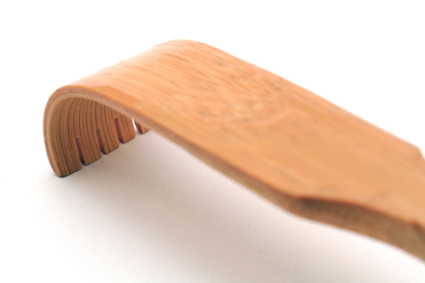 A wooden back scratcher