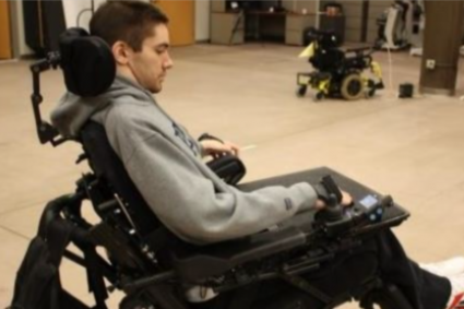 Man in power wheelchair
