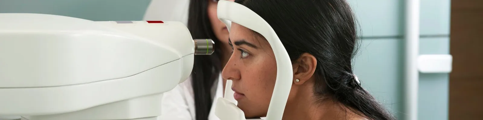 Photo of woman taking eye test