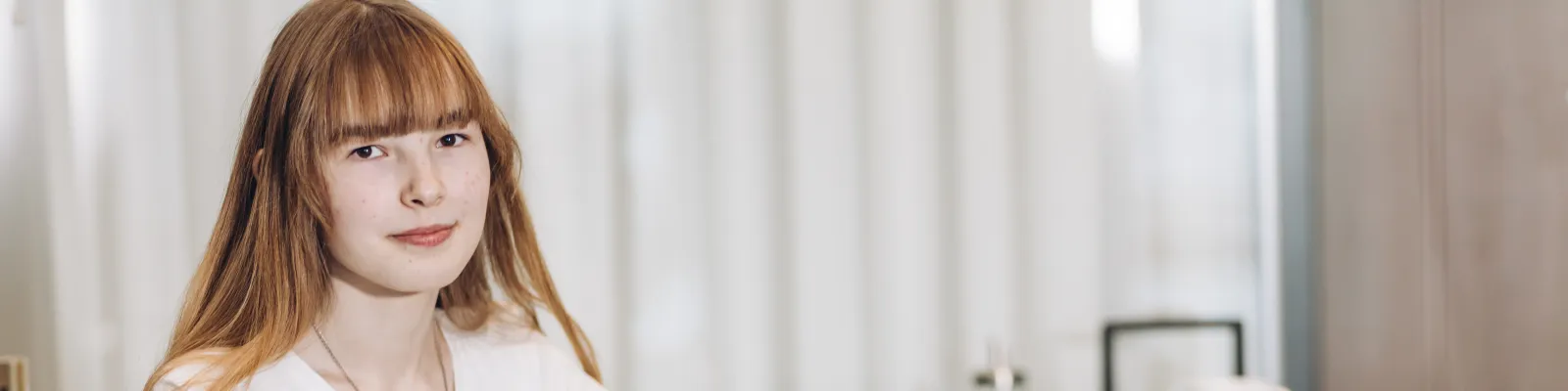 Photo of girl with prosthetic arm