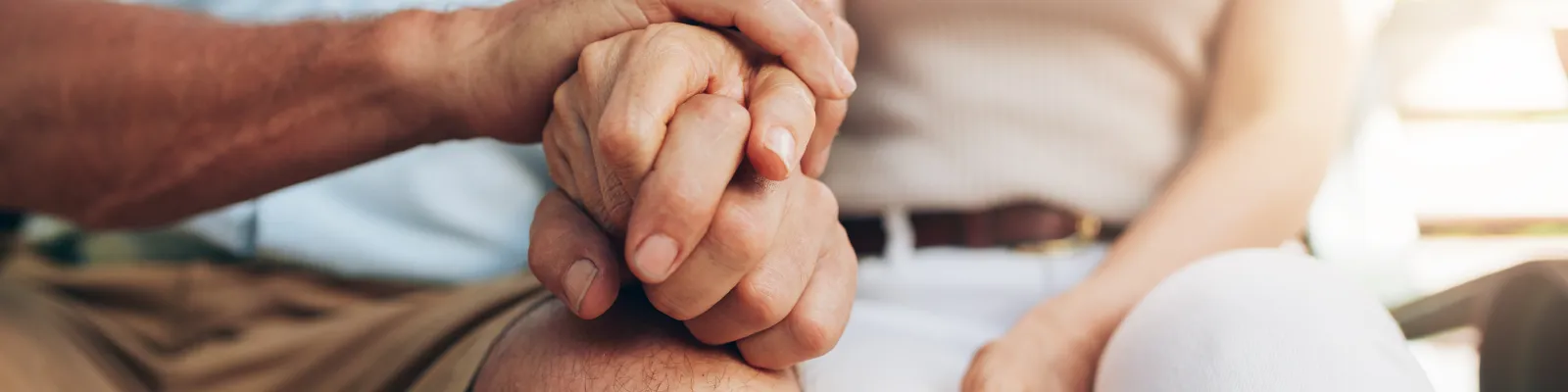 Photo of couple holding hands
