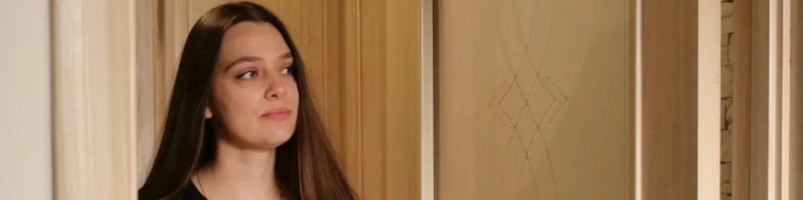 Person walking into a room