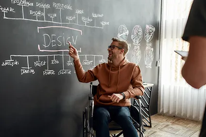 Instructor at chalkboard