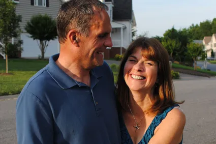 A couple smiling at each other