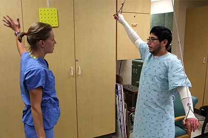 Man with burn injury in inpatient rehabilitation