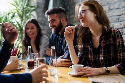 Group of friends eating together