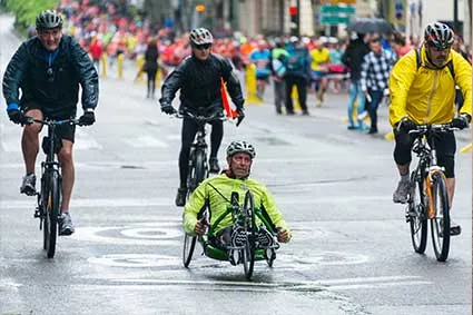 Man riding handbike in bicycle race