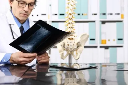 Doctor viewing x-ray