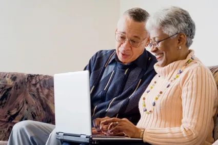 People looking at computer