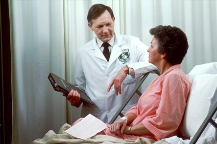 Doctor speaking with patient in the hospital