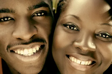 Two people smiling 