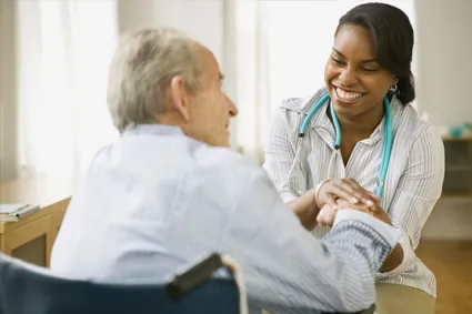 Doctor comforting patient