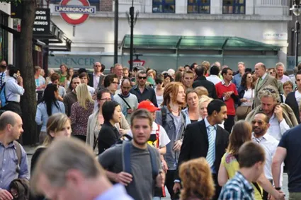 Busy street with pedestrians walking
