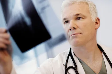  Doctor looking at x-ray 