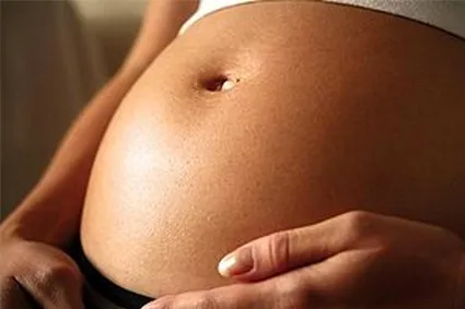 Photo of pregnant person's stomach 