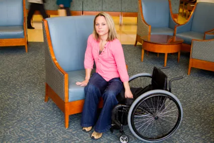 Person transferring to their wheelchair