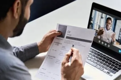 man holding resume