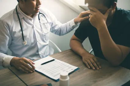 Photo of therapist with patient