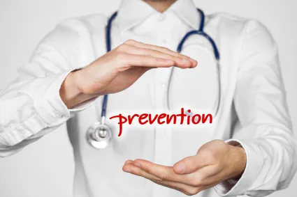 Photo of clinician with illustration of word that says PREVENTION