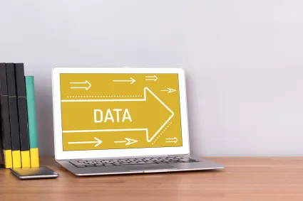 Photo of laptop that says DATA on the screen