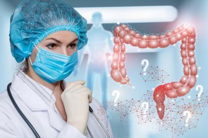 Photo of clinical staff with illustration of bowels