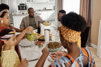 Photo of family having dinner