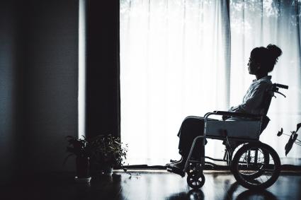 Photo of woman in wheelchair