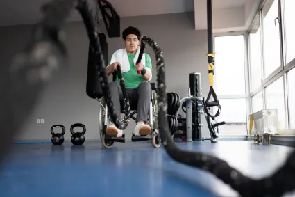 Photo of man with burn injury exercising