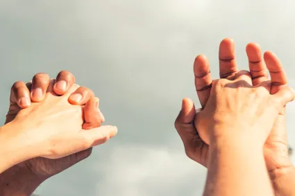 Photo of couple holding hands
