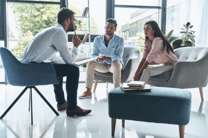 Photo of couple with therapist