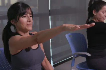Photo of woman with burn injury doing yoga