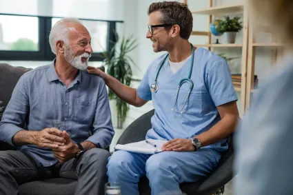 Photo of clinician with man