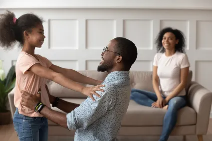 Photo of family in living room