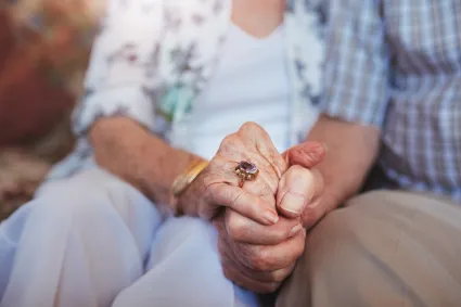 Photo of couple holding hands