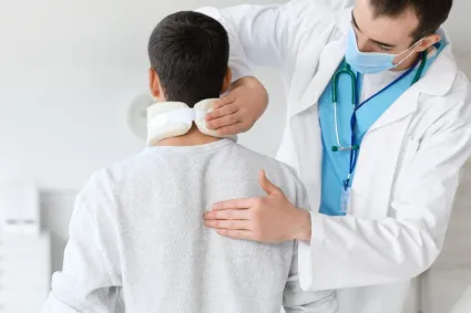 Doctor Treating SCI Patient