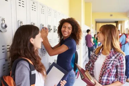 friends at locker in school 