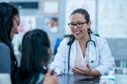 Family talking with doctor 