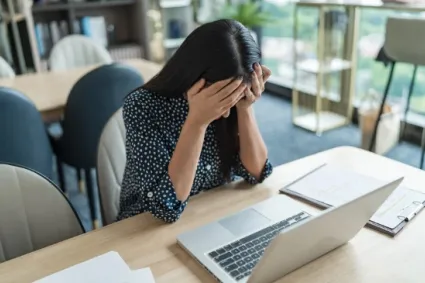 person having negative response on computer 