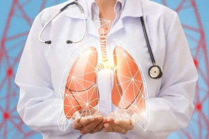 Photo of clinical staff with illustration of respiratory tract