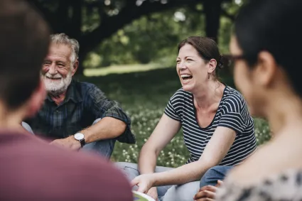 Photo of woman enjoying time with a group of friends