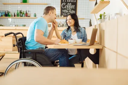 Photo of couple sharing dinner