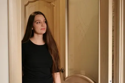 Person walking into a room