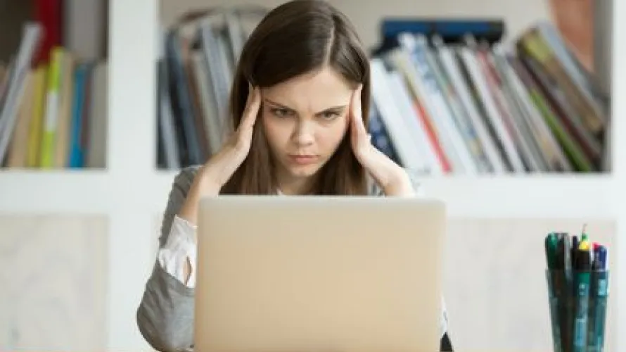 Person looking at computer.