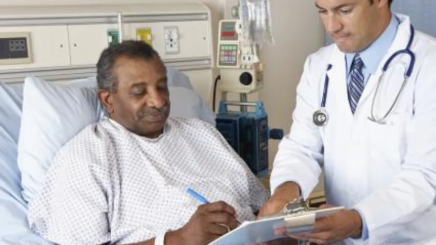 Clinician speaking with patient