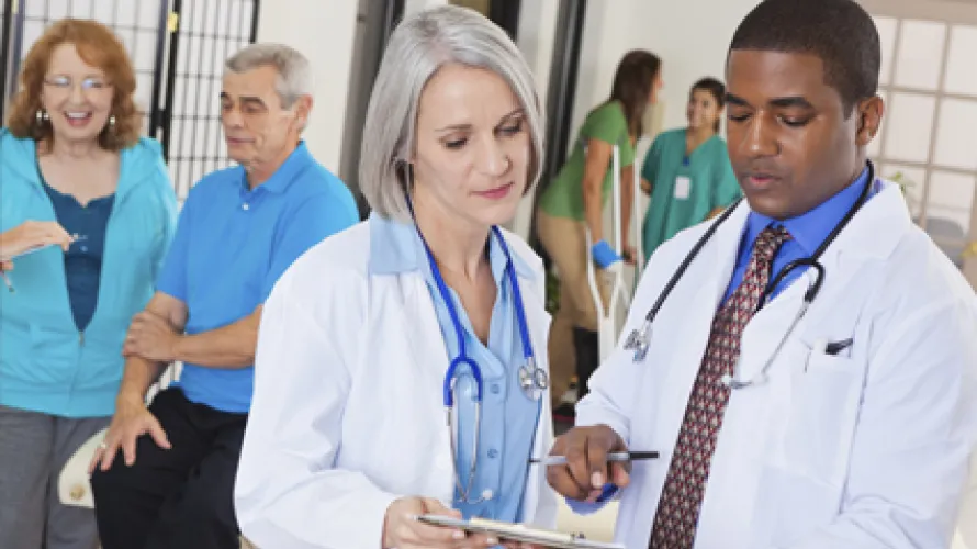 Doctors discussing a chart