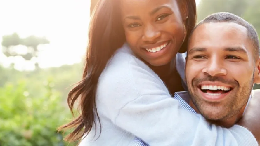 Couple hugging and smiling
