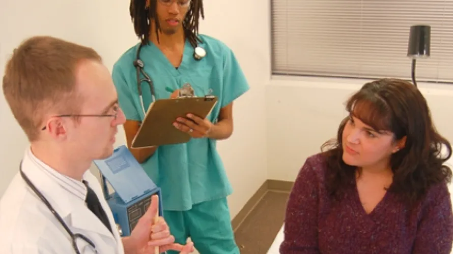 Doctor's speaking to patient in the office