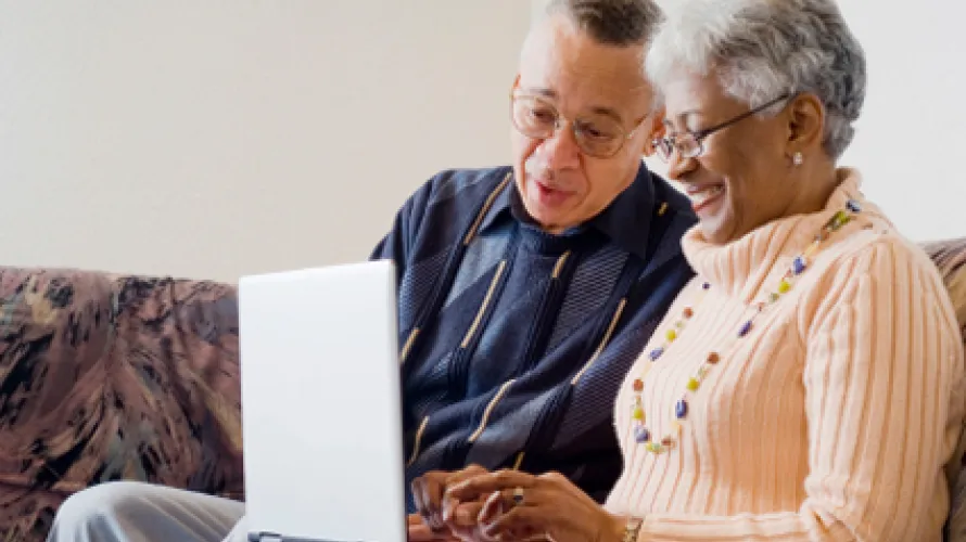 People looking at computer