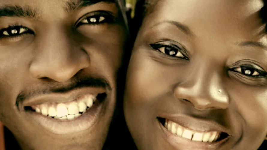 Two people smiling 