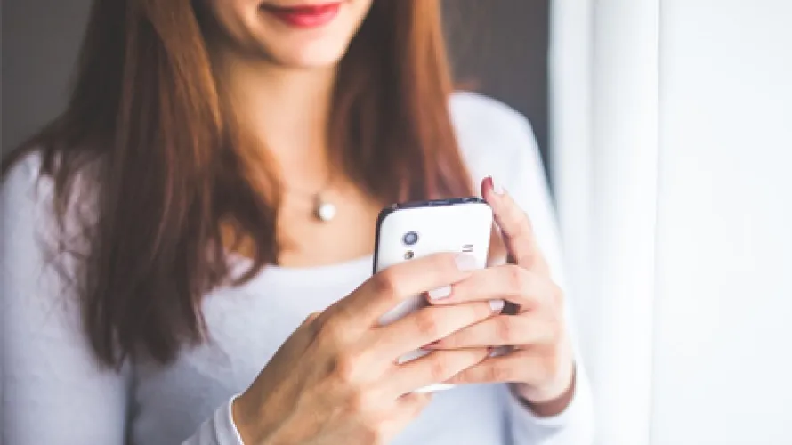 Person texting on phone